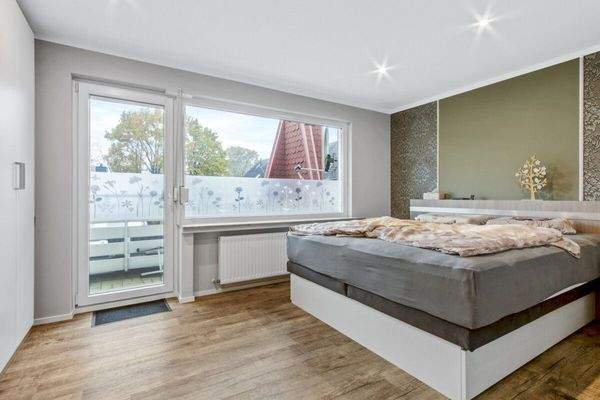 Schlafzimmer mit Balkon
