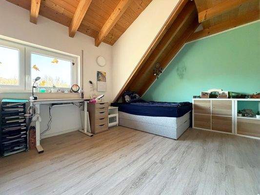 Schlafzimmer 2: ...für Gemütlichkeit und Zuhause