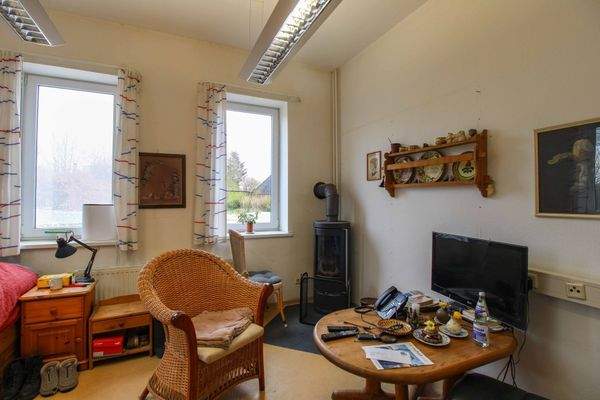 Zimmer mit Kaminofen