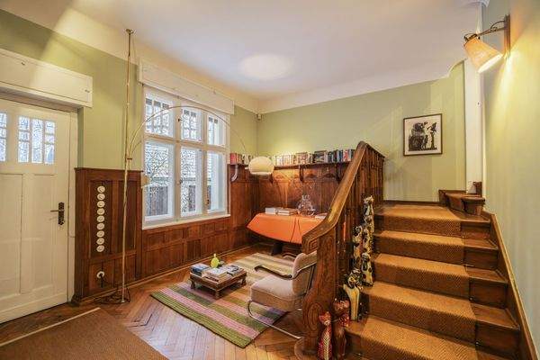 Hunting room with original wood paneling