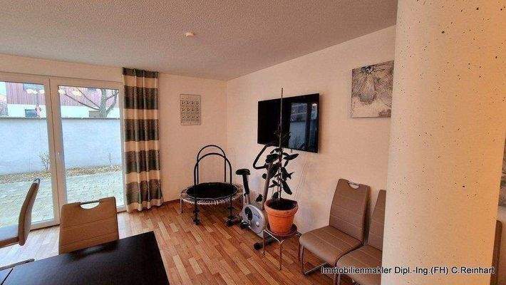 8 EG Gemeinschatsraum mit Außenbereich (2).jpg