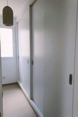 Schlafzimmer mit Ankleideraum