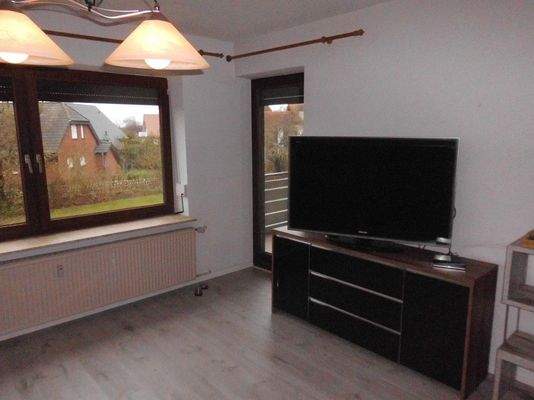 Wohnbereich mit Zugang zu Loggia