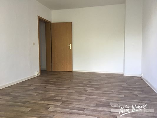 Wohnzimmer mit Balkon