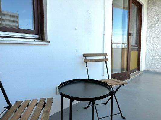 Balkon mit Sitzgelegenheit