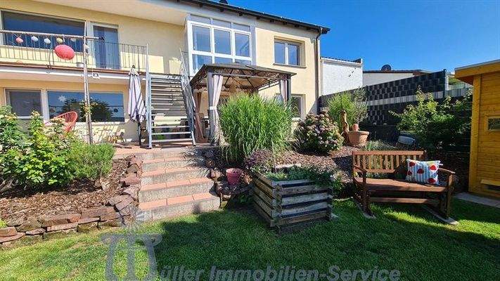 Foto 7_Rückansicht - Treppe zum EG.jpg