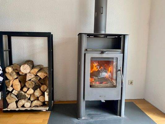 Holzofen Appartement Kind3