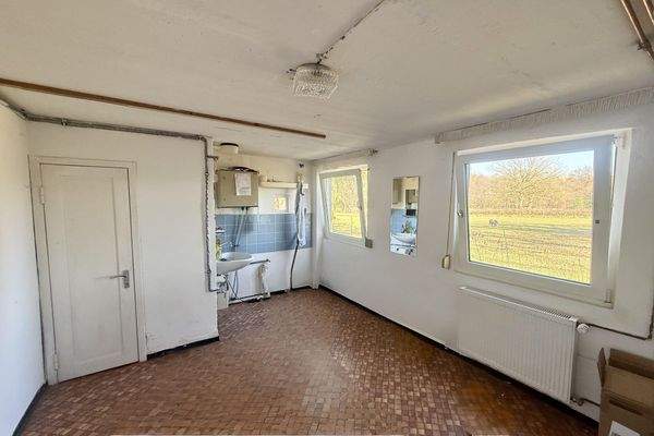 Anbau mit WC und Waschbecken