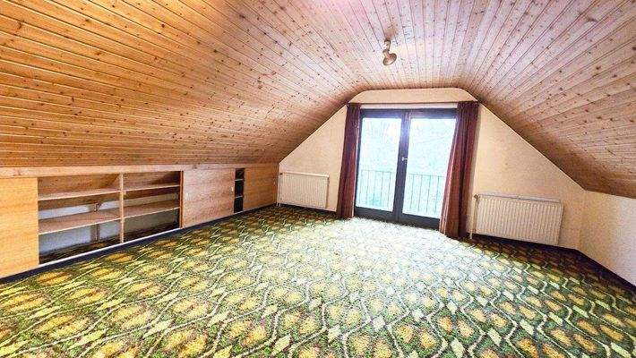 18_Schlafraum Obergeschoss.jpg