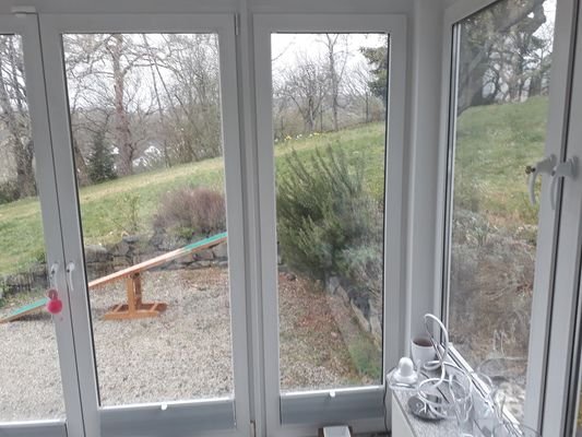 Wintergarten und Sitzplatz vor der Küche