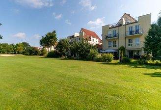 Terrassenwohnung mit direktem Blick auf den Golfplatz