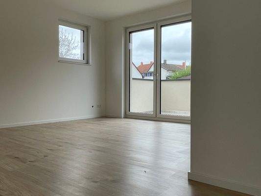 Schlafzimmer mit Balkon