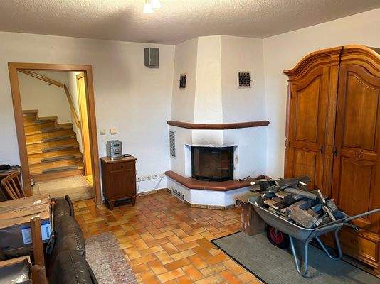 Zimmer im UG mit Holzofen