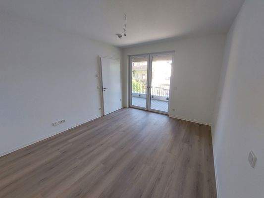 Zimmer mit Balkonzugang