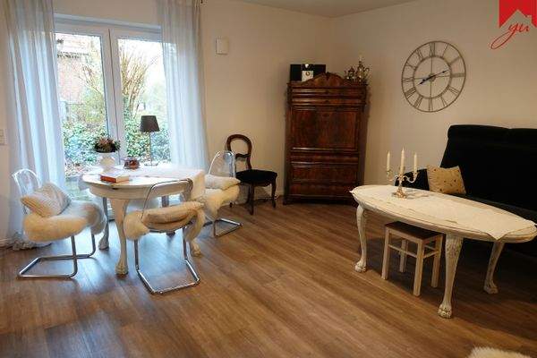 Wohnzimmer mit Zugang zur Terrasse