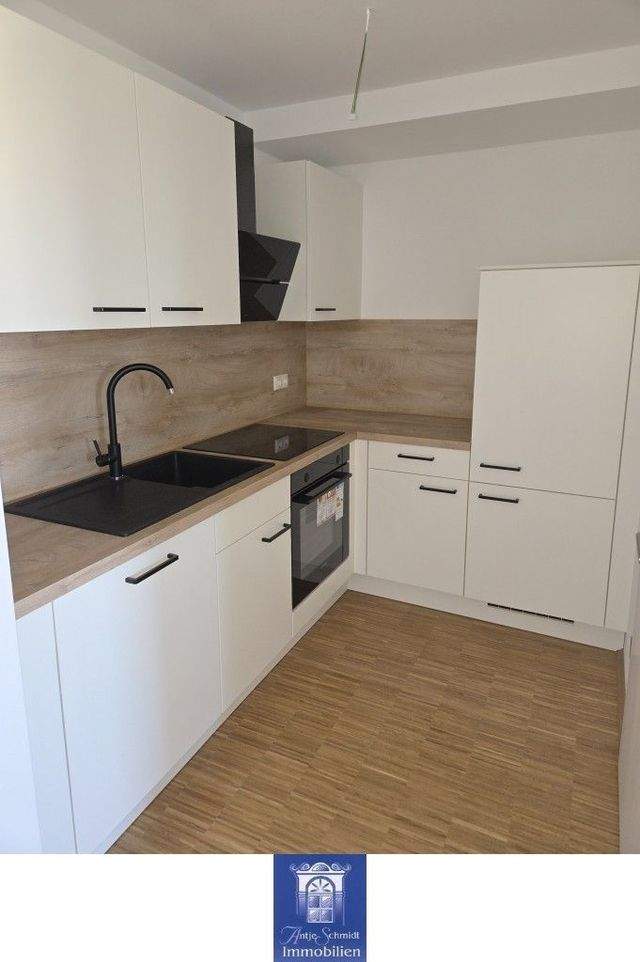 Hochwertige Neubauwohnung mit Balkon, EBK und Fußbodenheizung! ERSTBEZUG! - Photo 1