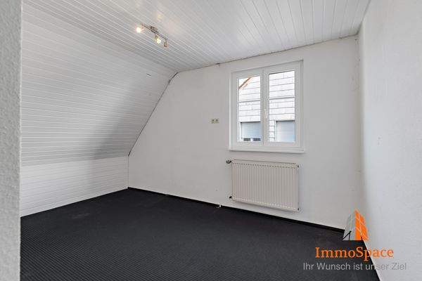 Blick in das Kinder- oder Freizeitzimmer im Obergeschoss