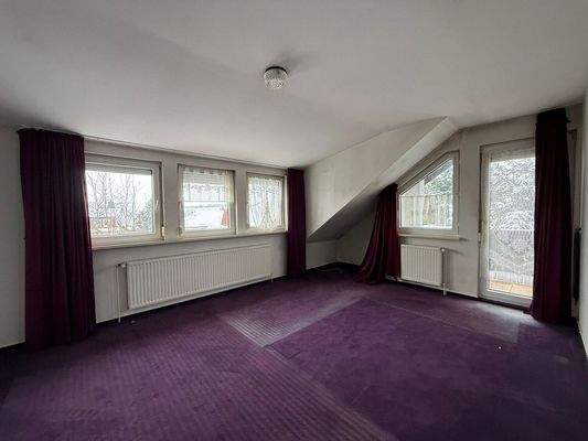 Dachgeschoßzimmer I mit Balkon