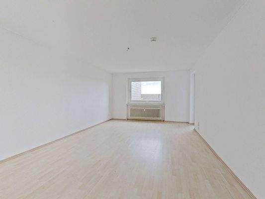 Ansicht II: Wohn- und Esszimmer mit Zugang zum Balkon