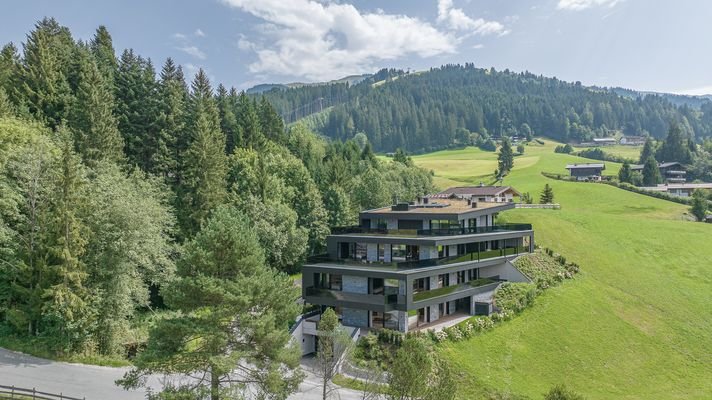 KITZIMMO-Luxuswohnung im Chaletstil kaufen Immobilien Kirchberg Tirol.