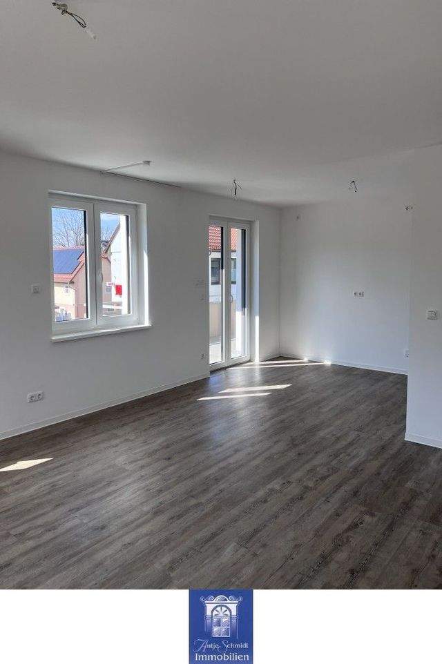 Modern ausgestattete Familienwohnung mit Balkon und Fußbodenheizung! - Foto 3