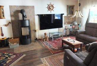 Wohnzimmer mit Kaminofen.JPG