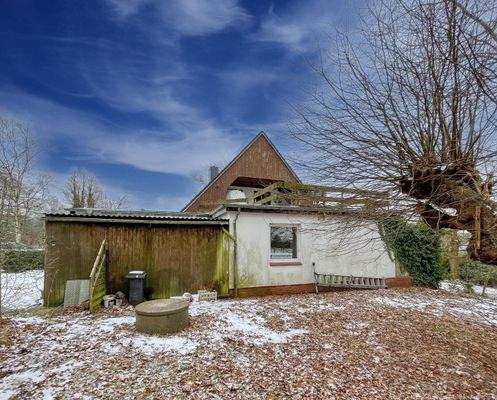 Anbau mit Dachterrasse und Garage