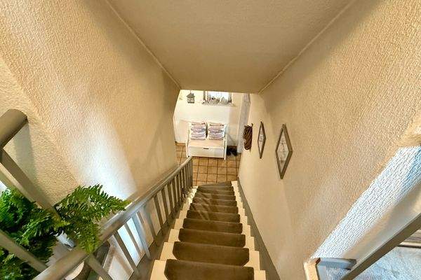Treppe ins Obergeschoss
