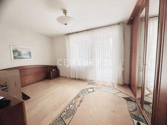 Schlafzimmer mit Zutritt zur Terrasse