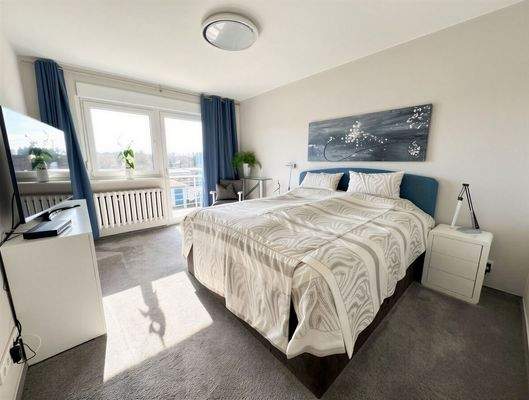 Schlafzimmer mit Balkon