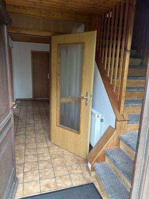 Windfang mit Zugang in beide Wohnungen