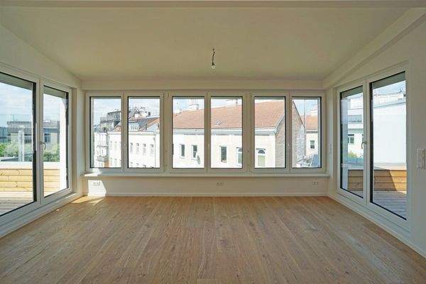 Wohnküche mit Ausgang auf beide Dachterrassen