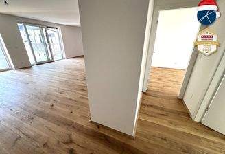 Wohnküche und Gang zu den Zimmern