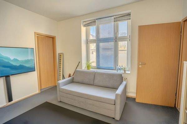 Wohnzimmer digital möbliert