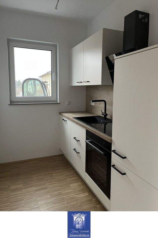 Lieblingsplatz mit attraktiver Ausstattung, moderner EBK und Terrasse im Erstbezug! - Foto 1