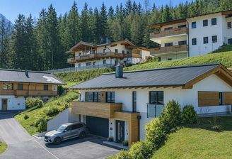KITZIMMO-Exklusives Einfamilienhaus in Toplage - Immobilien Waidring.