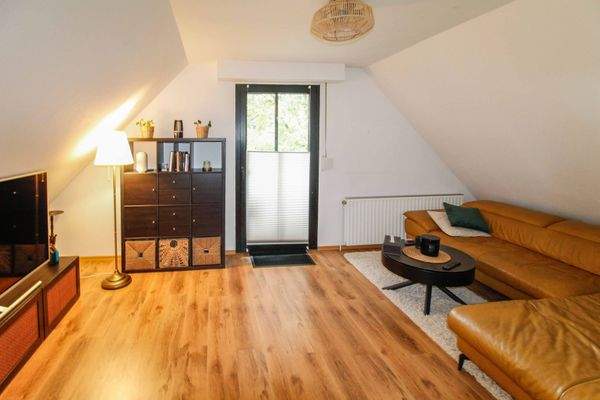 Wohnzimmer ELW mit Loggia-Zugang