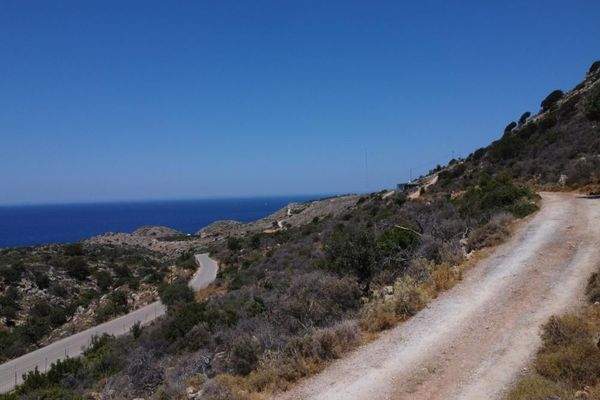 Kreta, Kokkino Chorio: Ruhiges Hanggrundstück mit ewigem Meerblick zu verkaufen