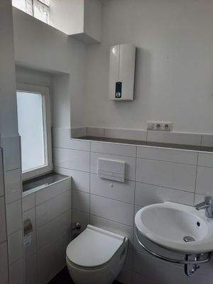 Bad mit Fenster und Oberlicht 