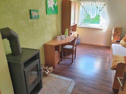 DG Gästezimmer mit Kaminofen