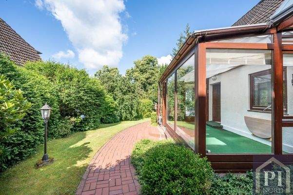 Wintergarten mit Zugang zum Haus