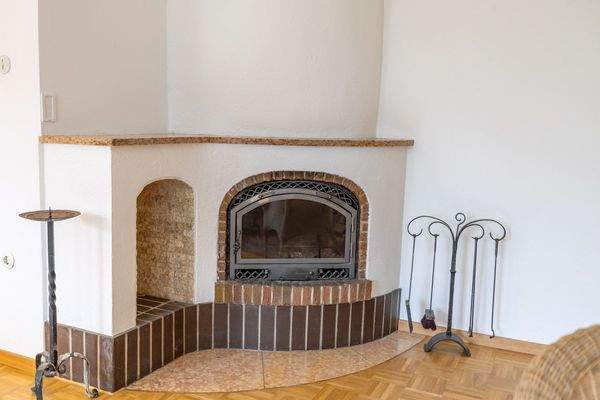 Familienidyll in Bogenhausen: Doppelhaushälfte mit sonnigem Westgarten & Grünblick