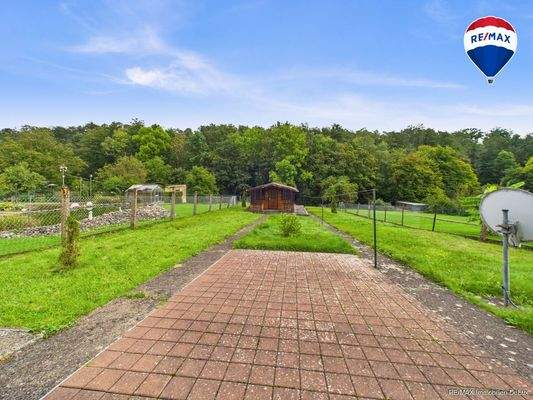 RE/MAX Immobilien DeLux Einfamilienhaus Nalbach Garten