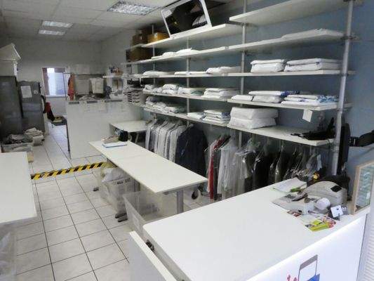 Textilreinigung und Heißmangel