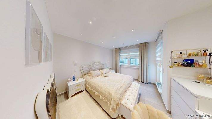 Schlafzimmer mit Ankleidebereich