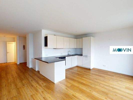 Ansicht I: Wohn- und Esszimmer mit offenem Küchenbereich