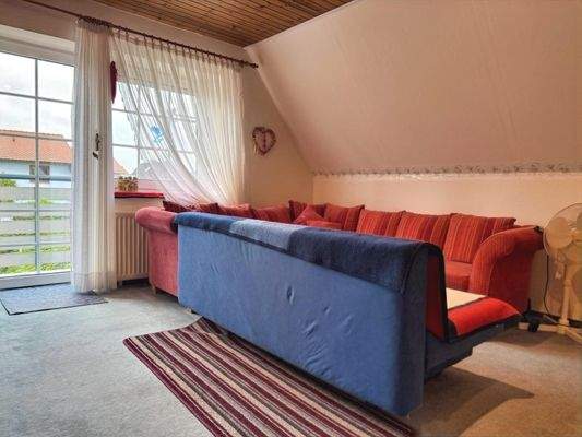 eines der schönen Zimmer im DG mit Zugang zum Balkon