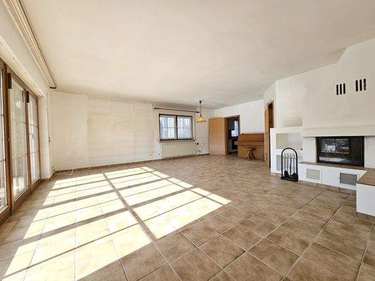 Wohnzimmer mit gemütlichem Kaminofen