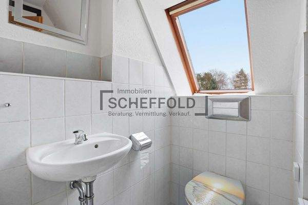 Gäste-Toilette (mit KI leergeräumt)