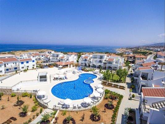 Flat Near the Sea in a Well-Developed Project with Pool in Girne
